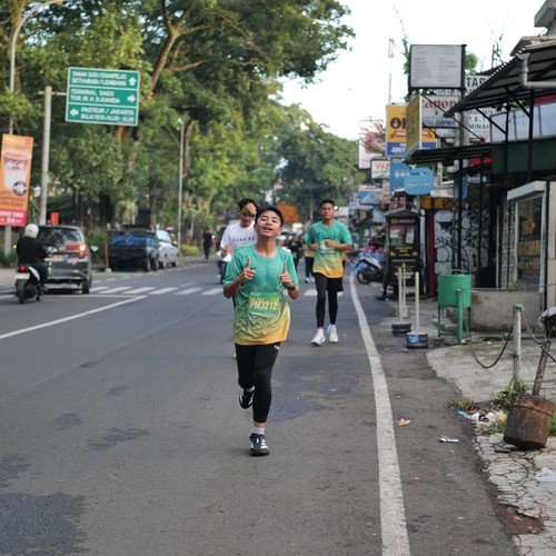 Race photo from BAUR RUN 2025