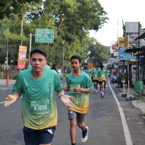 Race photo from BAUR RUN 2025