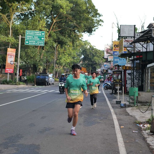 Race photo from BAUR RUN 2025