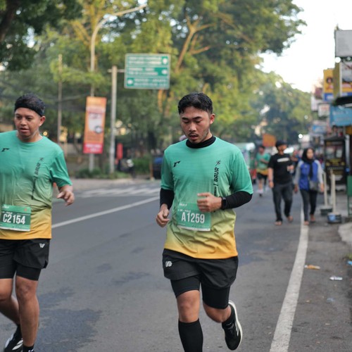 Race photo from BAUR RUN 2025
