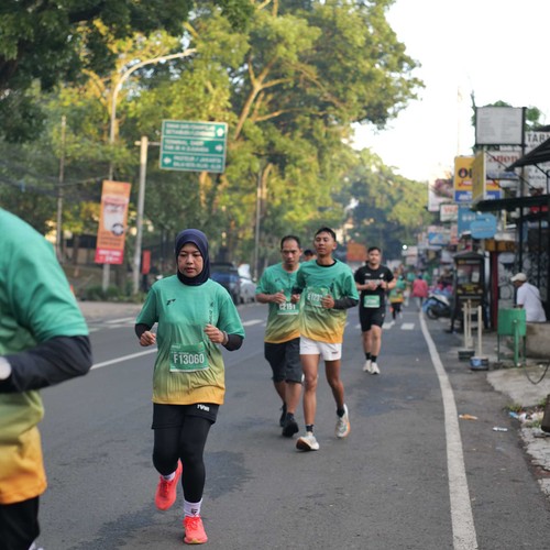 Race photo from BAUR RUN 2025