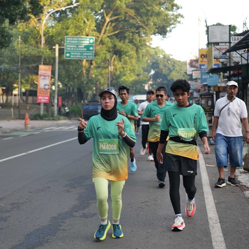 Race photo from BAUR RUN 2025