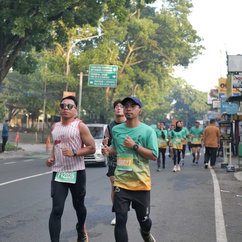 Race photo from BAUR RUN 2025