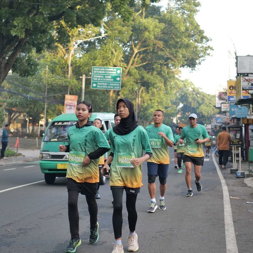 Race photo from BAUR RUN 2025