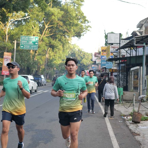 Race photo from BAUR RUN 2025