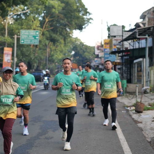 Race photo from BAUR RUN 2025