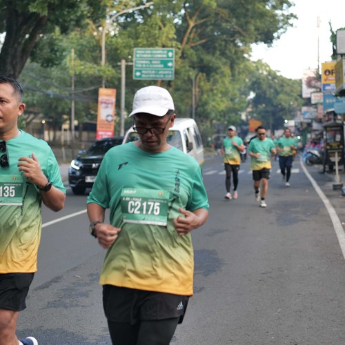 Race photo from BAUR RUN 2025
