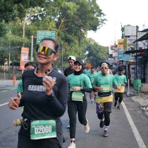 Race photo from BAUR RUN 2025