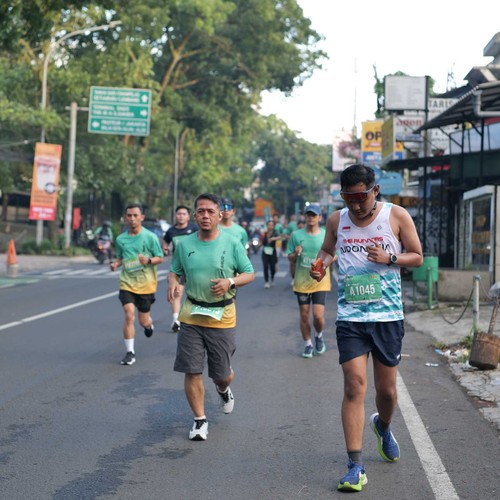 Race photo from BAUR RUN 2025