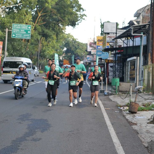 Race photo from BAUR RUN 2025