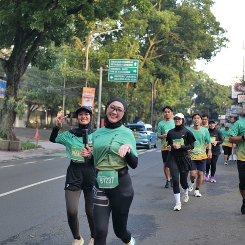 Race photo from BAUR RUN 2025