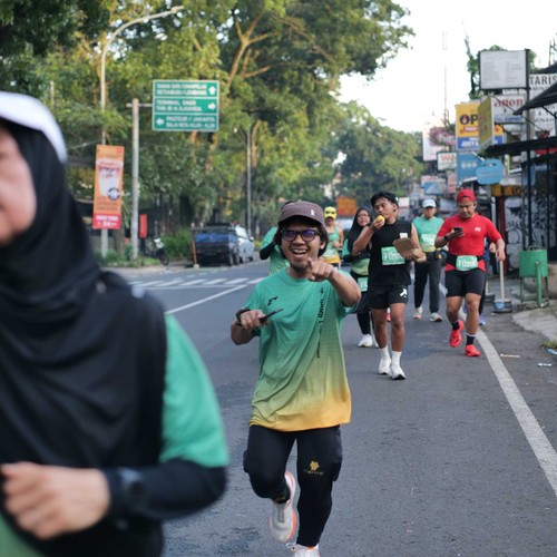 Race photo from BAUR RUN 2025