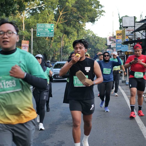 Race photo from BAUR RUN 2025