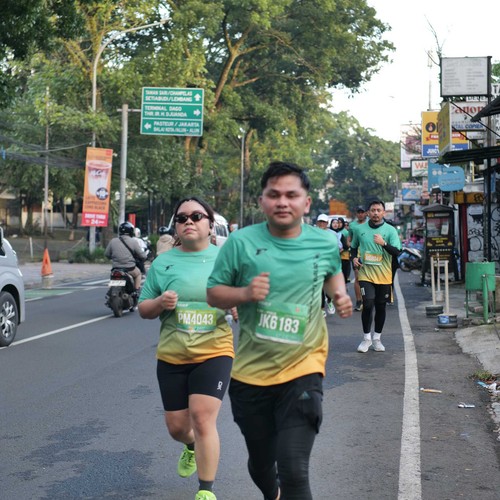 Race photo from BAUR RUN 2025