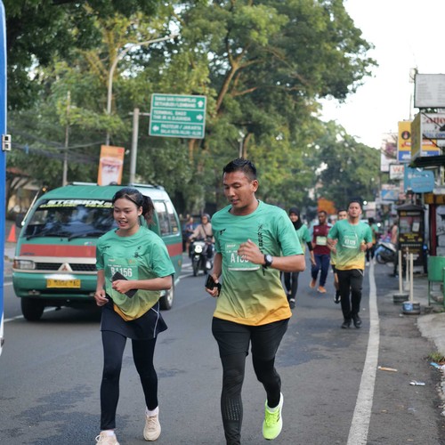 Race photo from BAUR RUN 2025