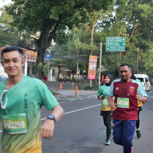 Race photo from BAUR RUN 2025