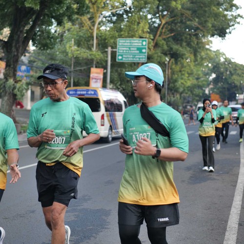 Race photo from BAUR RUN 2025