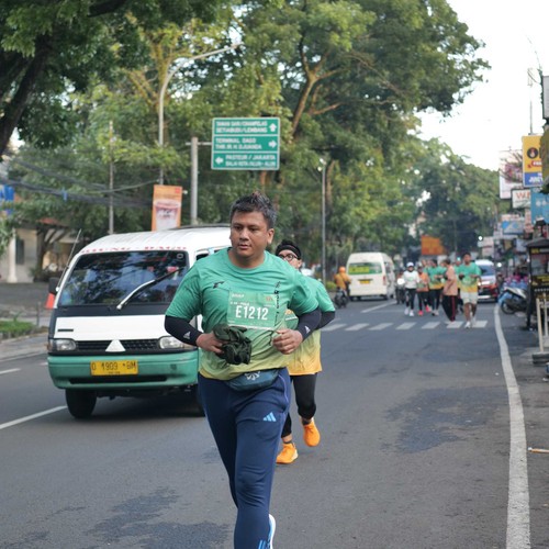 Race photo from BAUR RUN 2025