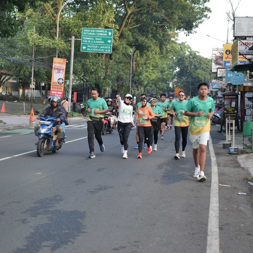 Race photo from BAUR RUN 2025