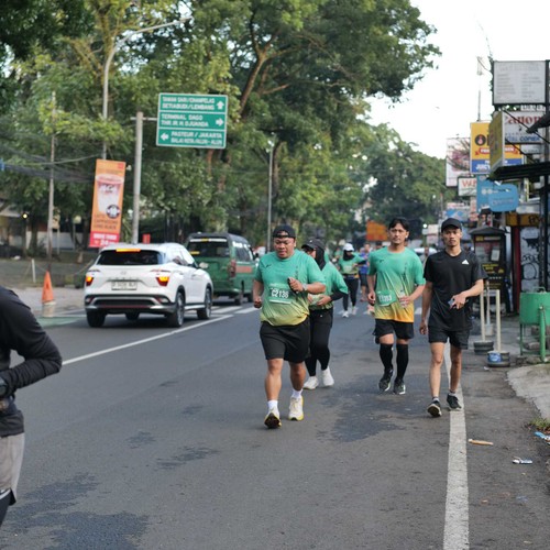 Race photo from BAUR RUN 2025