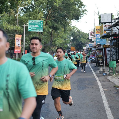 Race photo from BAUR RUN 2025