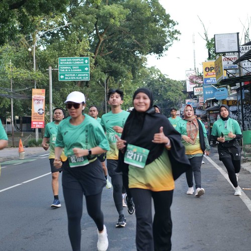 Race photo from BAUR RUN 2025