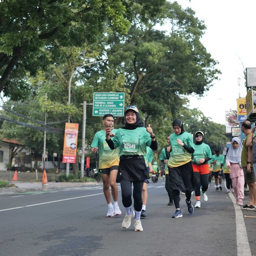 Race photo from BAUR RUN 2025
