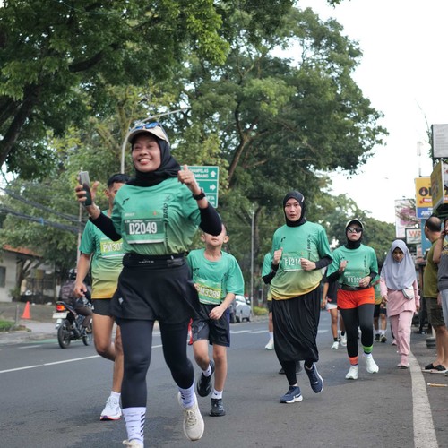 Race photo from BAUR RUN 2025