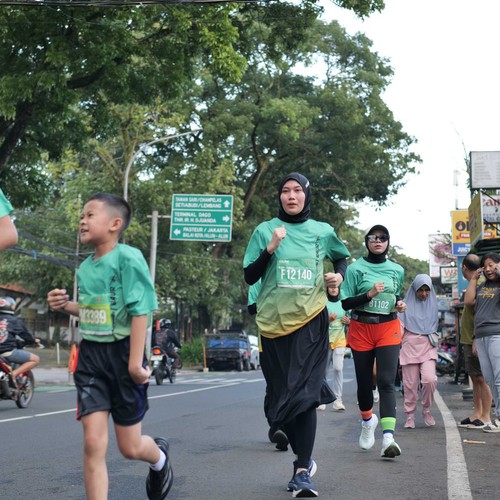 Race photo from BAUR RUN 2025