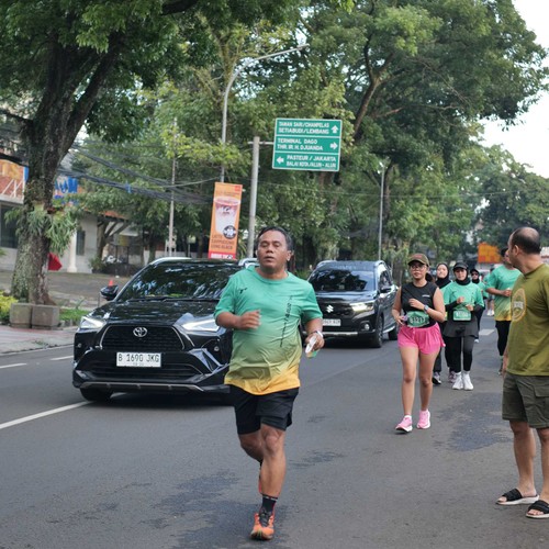 Race photo from BAUR RUN 2025