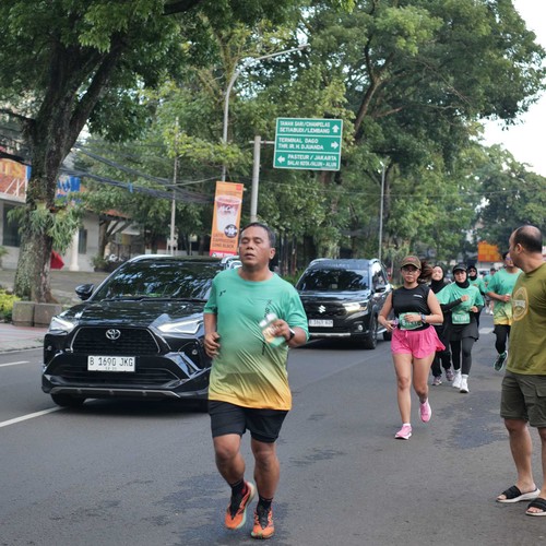 Race photo from BAUR RUN 2025