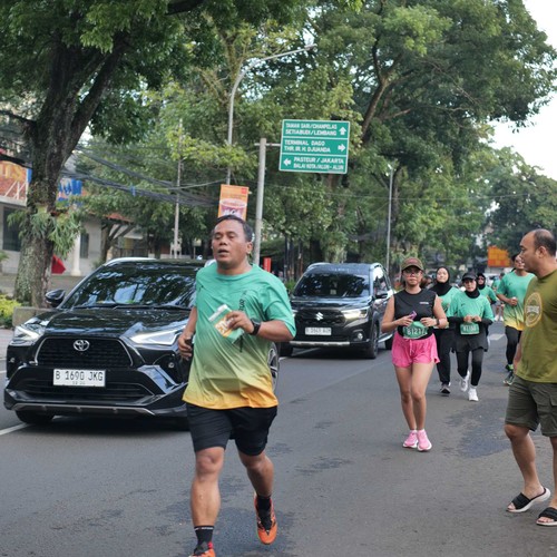 Race photo from BAUR RUN 2025