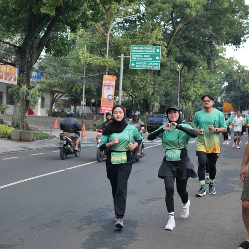 Race photo from BAUR RUN 2025