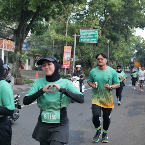 Race photo from BAUR RUN 2025
