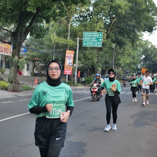 Race photo from BAUR RUN 2025
