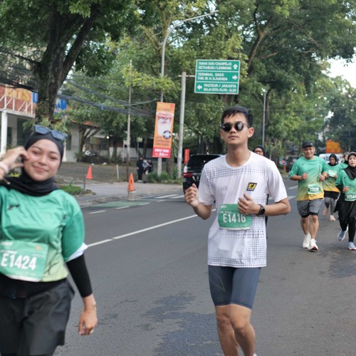 Race photo from BAUR RUN 2025