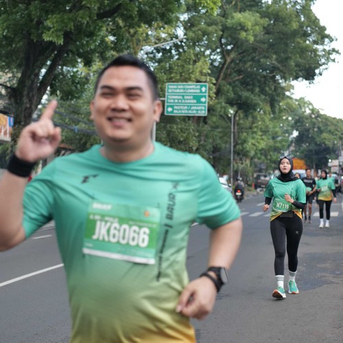 Race photo from BAUR RUN 2025