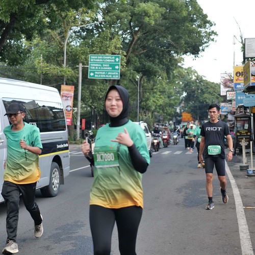 Race photo from BAUR RUN 2025
