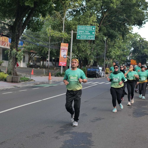 Race photo from BAUR RUN 2025