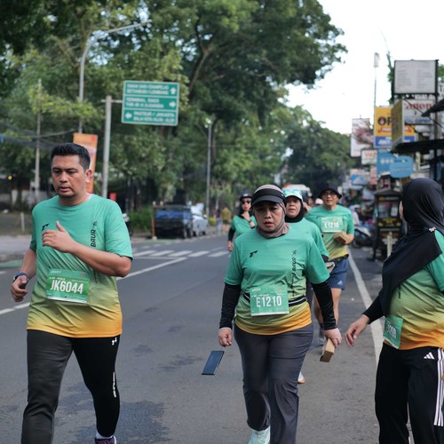 Race photo from BAUR RUN 2025