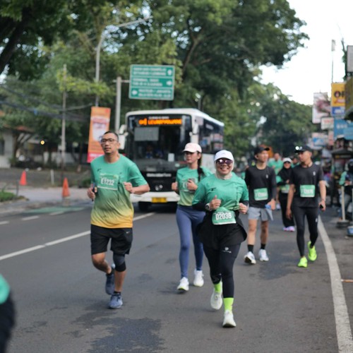 Race photo from BAUR RUN 2025