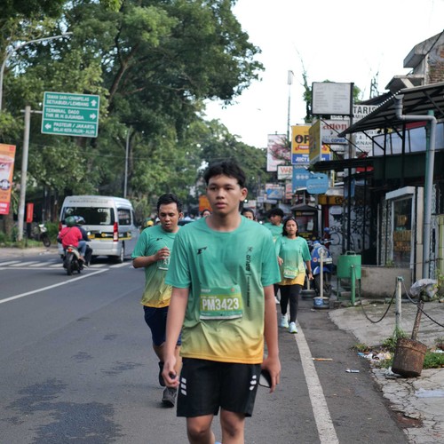 Race photo from BAUR RUN 2025