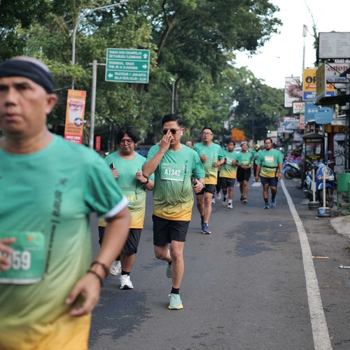 Race photo from BAUR RUN 2025