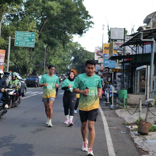 Race photo from BAUR RUN 2025