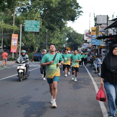 Race photo from BAUR RUN 2025