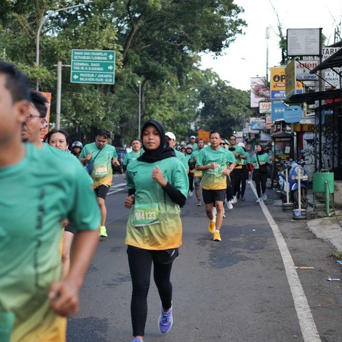 Race photo from BAUR RUN 2025