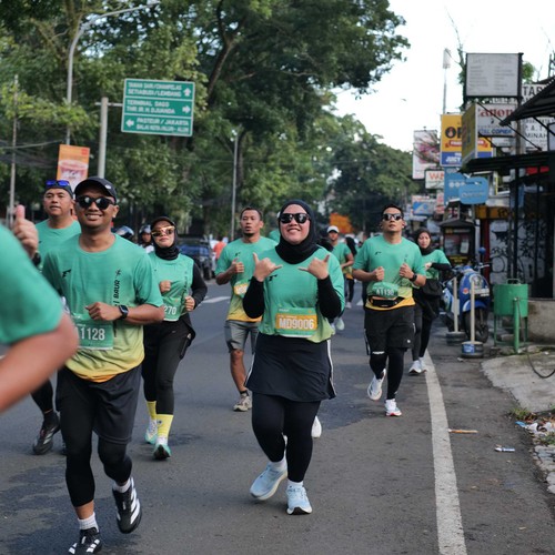 Race photo from BAUR RUN 2025