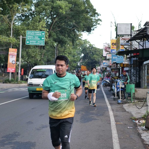 Race photo from BAUR RUN 2025