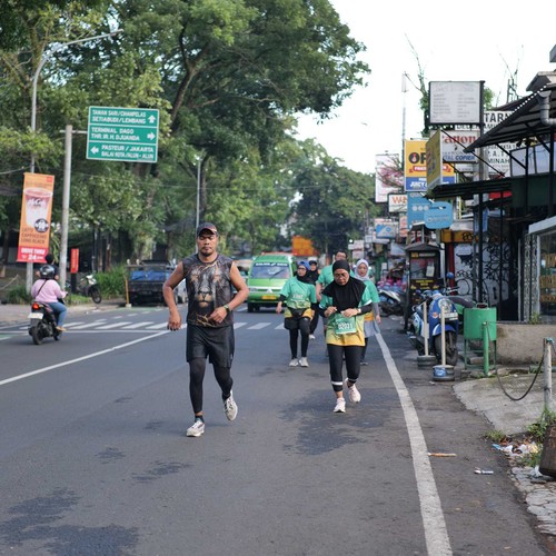 Race photo from BAUR RUN 2025