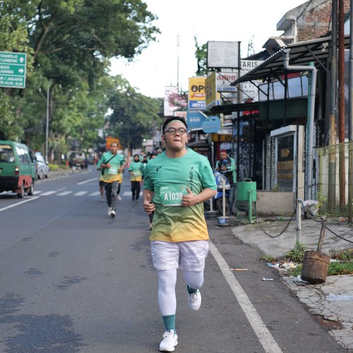 Race photo from BAUR RUN 2025